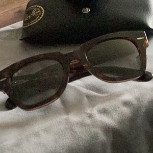 Ray-Ban tortoise shell sunglasses.